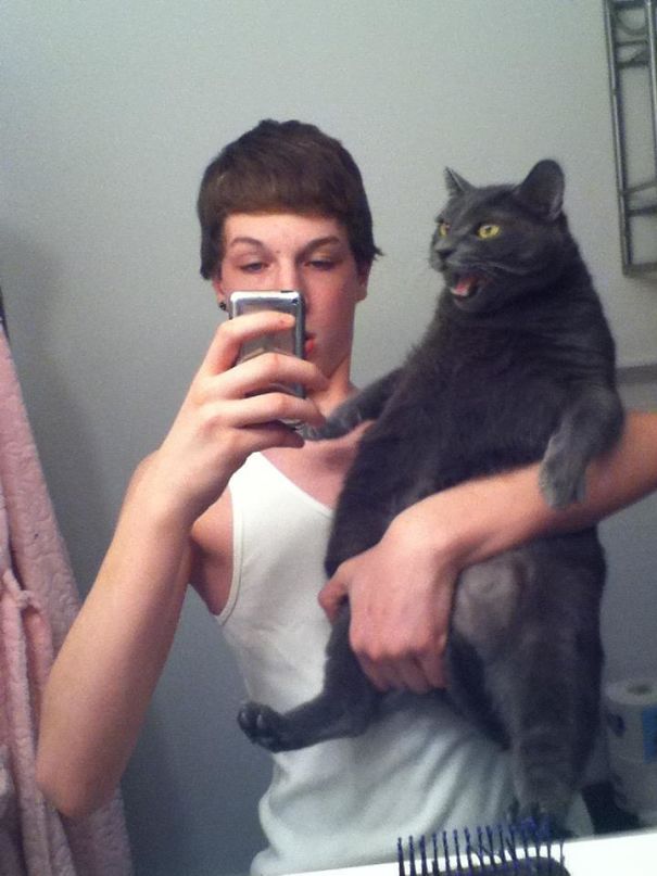 That's, Uh, Not How You Hold A Cat That's, Uh, Not How You Hold A Cat