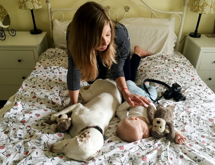 Baby and dog sleeping buds