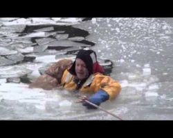 Raw: Firefighters Rescue Family Dog in Icy River