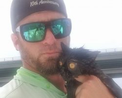Boat Captain Adopts Cat He Rescued After It Was Thrown Off A Bridge