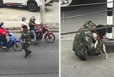 Struggling Street Performer Receives Warm Embrace From Dog After Being Ignored