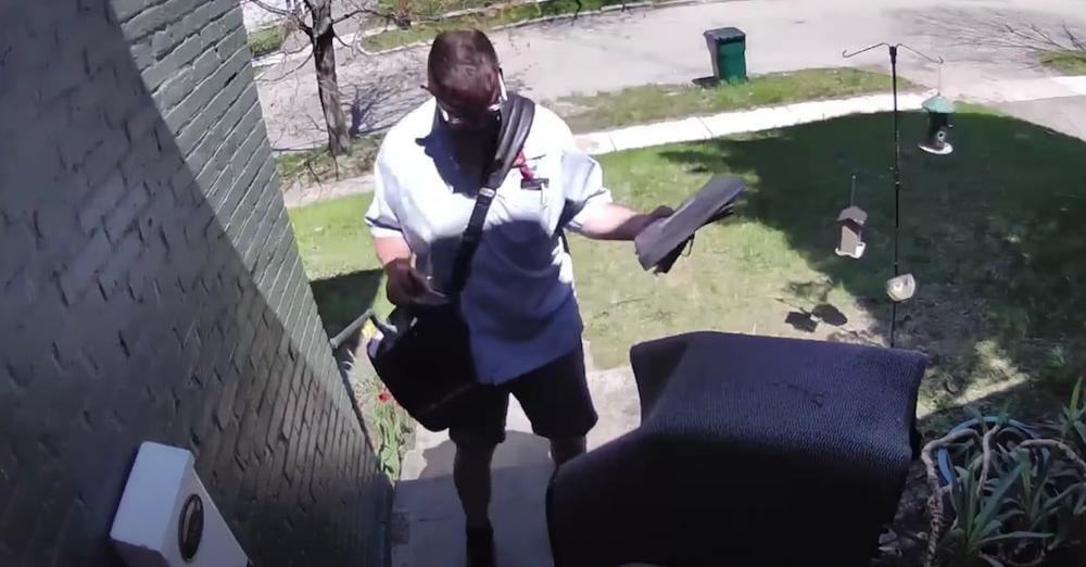 Postal Worker Takes Giant ‘Hulk’ Dog In Stride As He Delivers The Mail