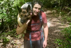 Hikers Spot a Mysterious Shape in the Woods — Then Realize a Dog Is Lying There, Unable to Move