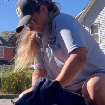 Mail Carrier Pauses Her Route To Rescue Tiny Squirrel Trapped In Storm Drain
