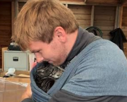 13-Year-Old Cat Still Insists On Being Carried Like A Baby